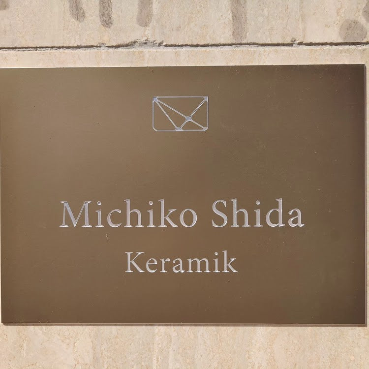 MichikoShida S Kurve Tassen 50ml /Untertassen 7,5cm W black splash